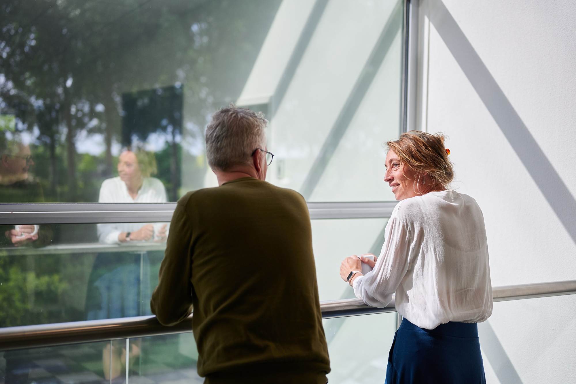 Twee NOM collega's in gesprek