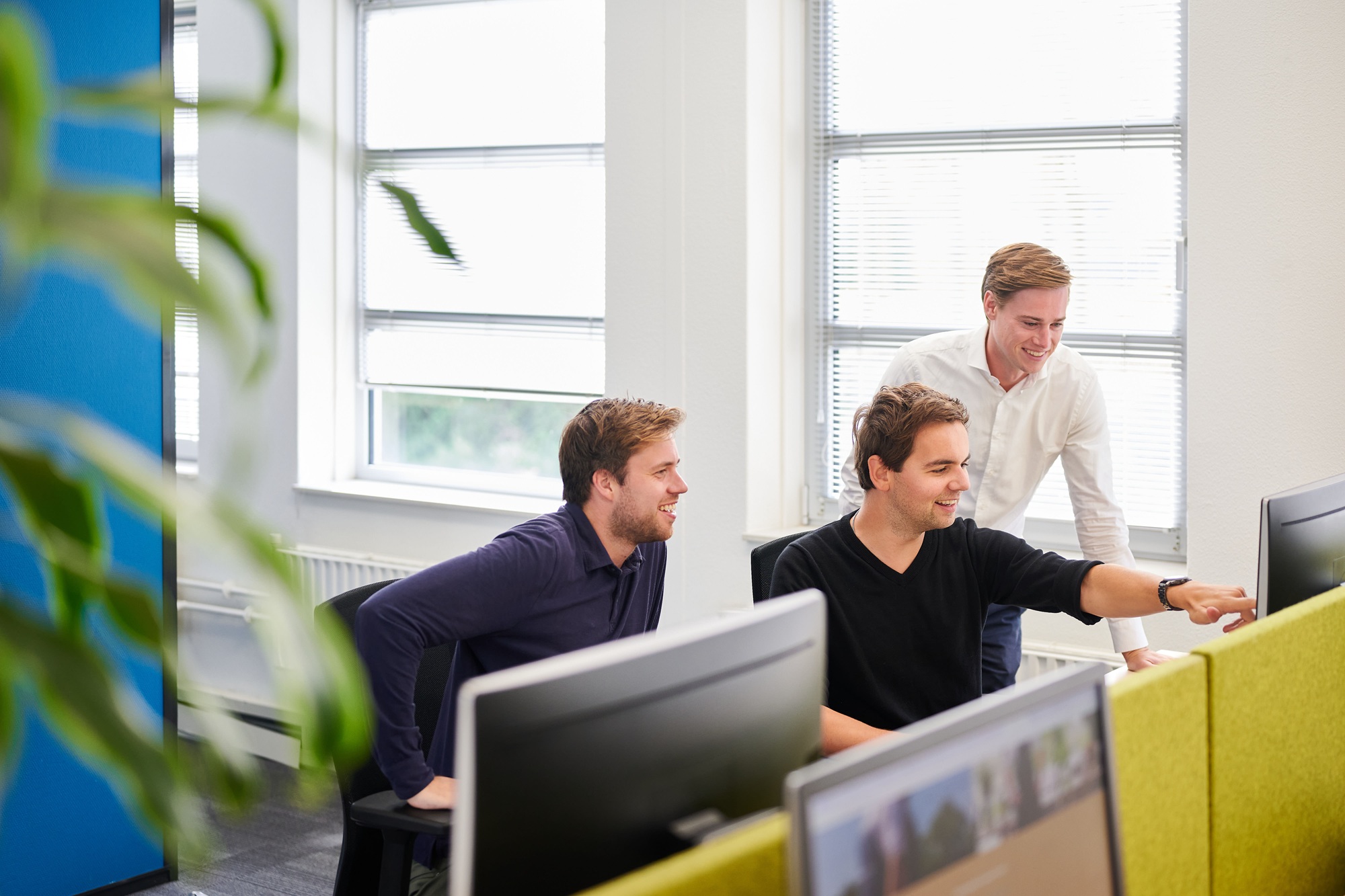 Drie collega's van NOM Investeren