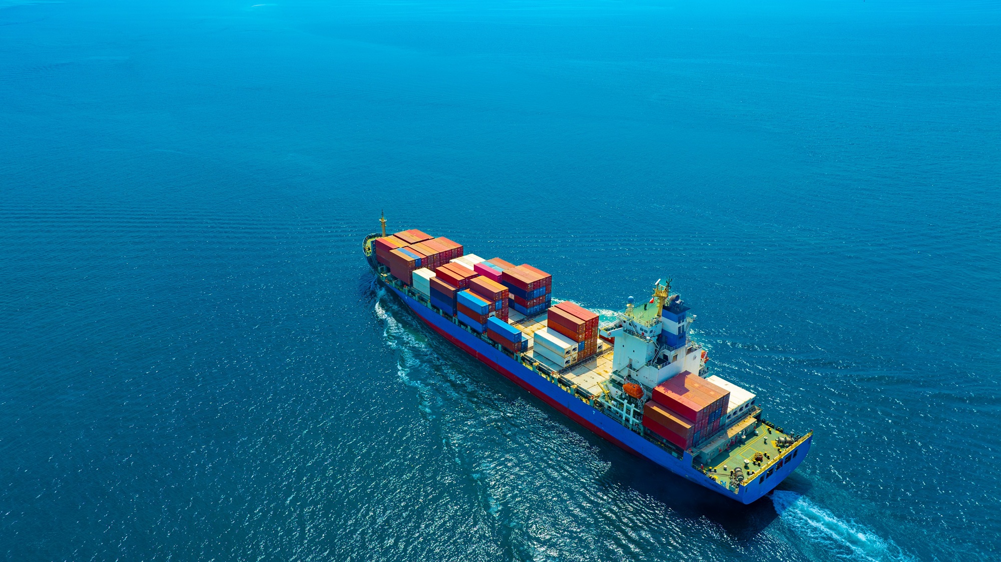 Aerial,View,Of,The,Freight,Shipping,Transport,System,Cargo,Ship